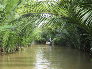 MK.07.BoatPuntingOnSideRiver