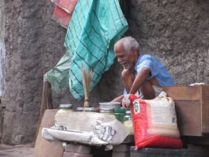 Man cooking soup for sale on the streets of Kolkata, near my hotel. 