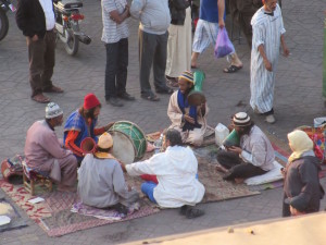 Drumming for dirhams.